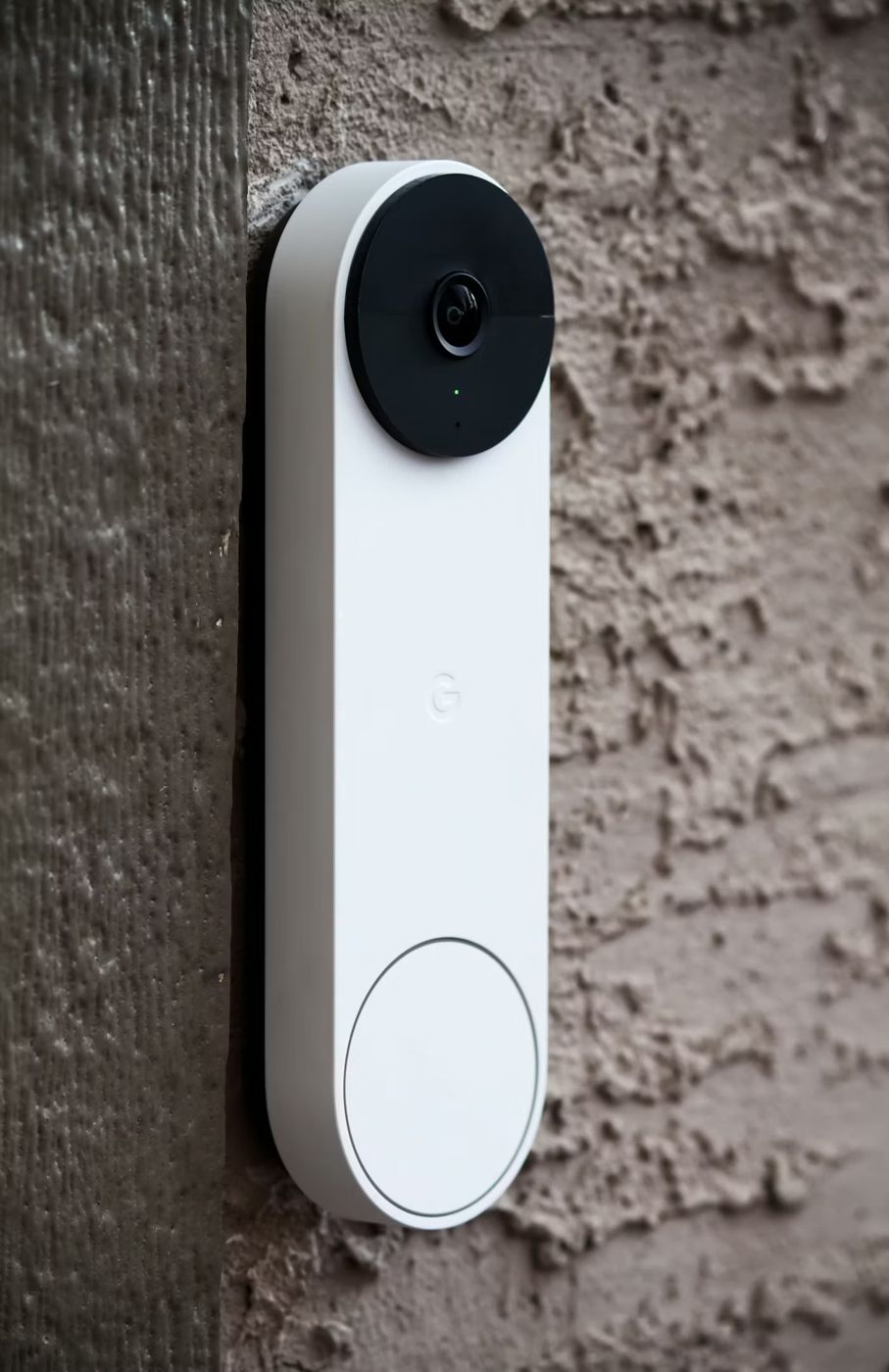 Video doorbell mounted beside a front door